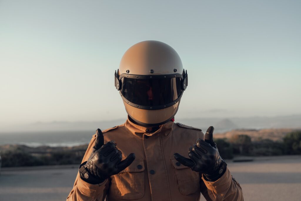 Motorcycle rider with helmet